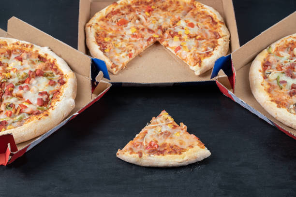 istock Three kind so pizza in pizza box. Fresh mozzarella pizza slice 1304330068