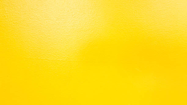 istock Texture of the yellow cement wall for background 1304330801