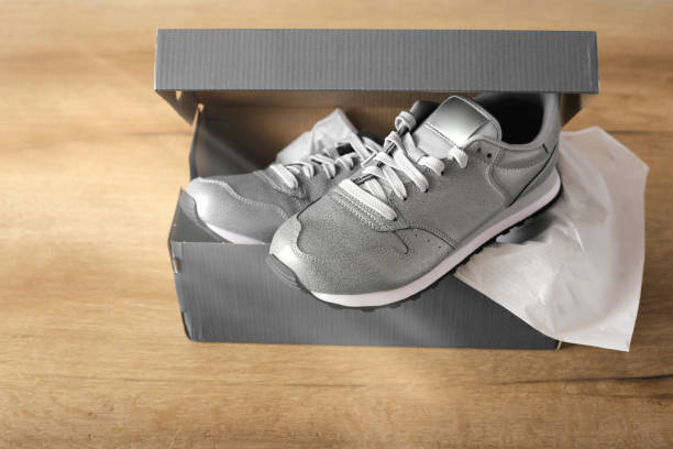 istock gray sneakers in box close up 1304332115