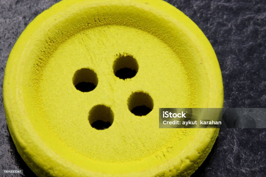 Yellow Buttons Row Closeup Yellow Buttons For Sewing On Black Background Stock Photo ...