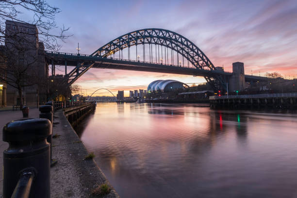 Colourful clouds glow at sunrise over the Tyne Bridge on February 27, 2021 Colourful clouds glow at sunrise over the Tyne Bridge on February 27, 2021 tyne bridge stock pictures, royalty-free photos & images
