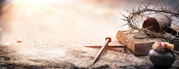 Calvary Of Jesus Christ - Crown Of Thorns And Cross Passion Of Jesus Christ - Hammer And Bloody Nails And Crown Of Thorns On Arid Ground With Defocused Background religious symbol photos stock pictures, royalty-free photos & images