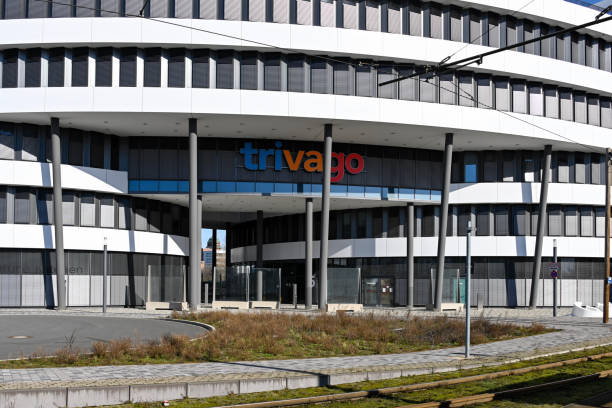 Trivago Headquarters in Duesseldorf Duesseldorf, Germany - February 21, 2021: The image shows the entrance of the Trivago  headquarter, a German transnational technology company specializing in internet services and products in the lodging and hotel field. media harbor photos stock pictures, royalty-free photos & images