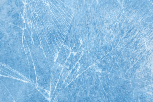 istock Frosty texture of cracked ice. 1304342124