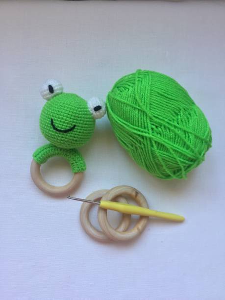 istock Baby rattles Handmade stuff froggy! 1304348656