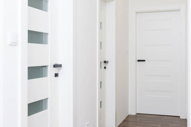 istock Hallway with white closed doors 1304349526