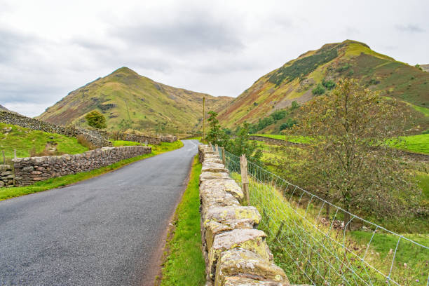 istock Along the empty lakeland road 1304358817