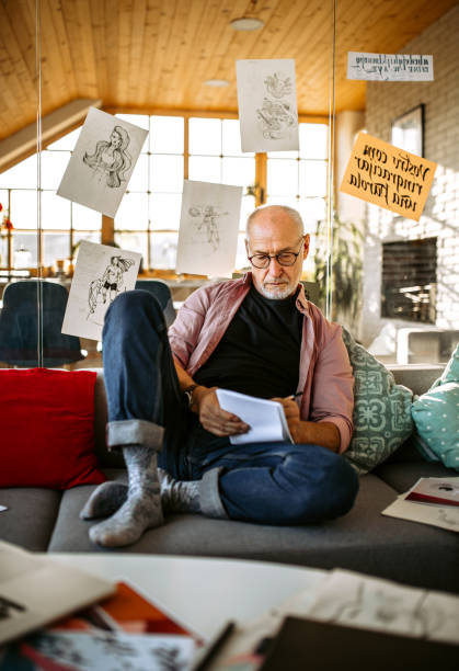 istock Senior Artist doing sketches for new art project 1304361457