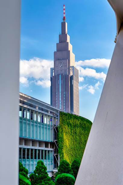 istock Japanese Travel Destinations. Clock Tower in Japan.Vertical Image 1304364210