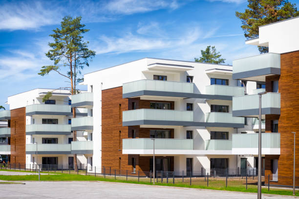 istock New modern complex of white apartment buildings 1304371363