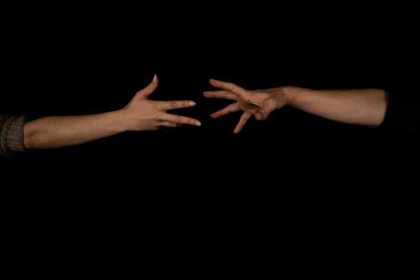 istock Man and woman holding hands 1304373557