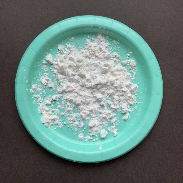 Cornstarch on Plate Cornstarch on paper plate starch grain stock pictures, royalty-free photos & images