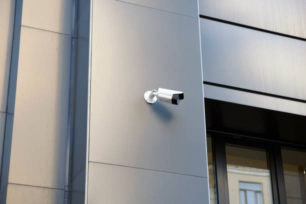istock Video surveillance system on the office building. 1304376315
