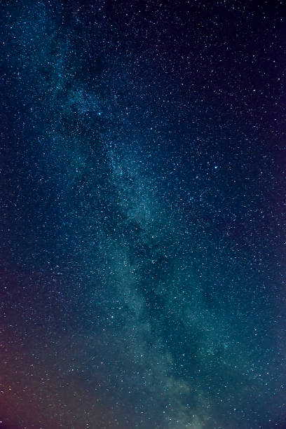 istock Landscape with gradient blue purple Milky way galaxy. Night sky with stars. 1304376328