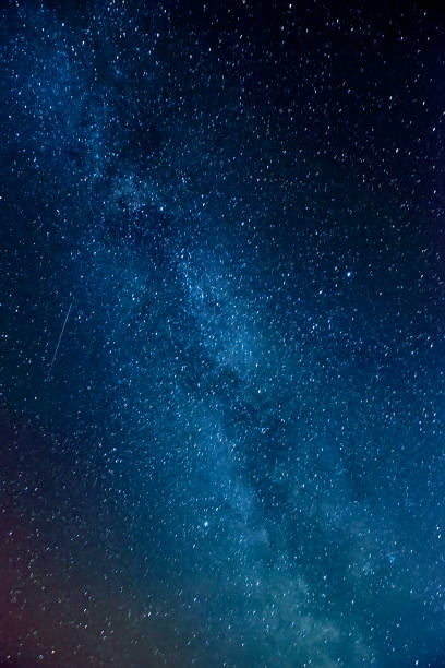 istock Landscape with gradient blue purple Milky way galaxy. Night sky with stars. 1304376329