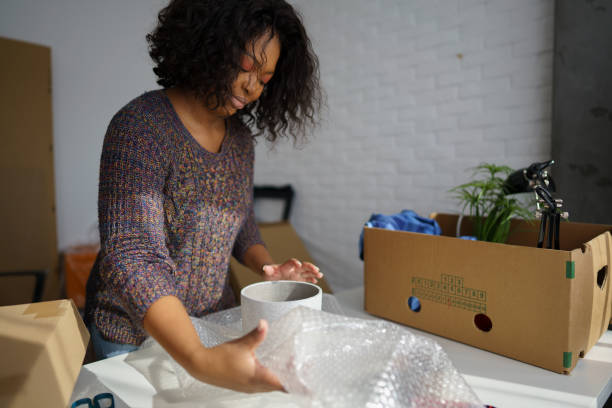 istock Young woman moving to a new apartment 1304380997