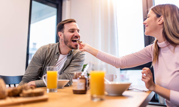 istock Young couple having breakfast together. 1304381730