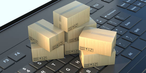 istock Carton moving boxes closed on laptop keyboard. 3d illustration 1304381827