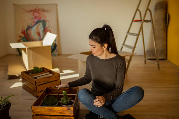 istock Young woman redecorating apartment. 1304382255