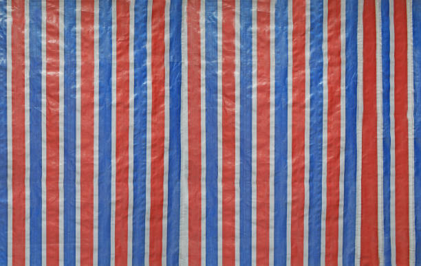 striped fabric texture, red, white and blue nylon bag stock photo