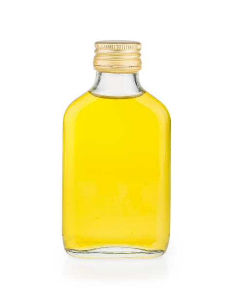 istock bottle with oil isolated on white background 1304383187