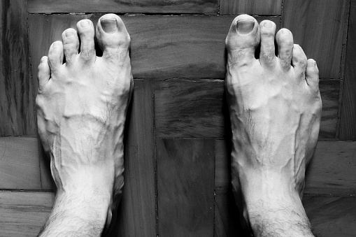 Pair of foot with veins showing [Black and White colors]