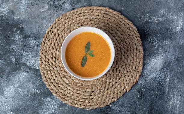 istock A white bowl of lentil soup on a marble background 1304384780