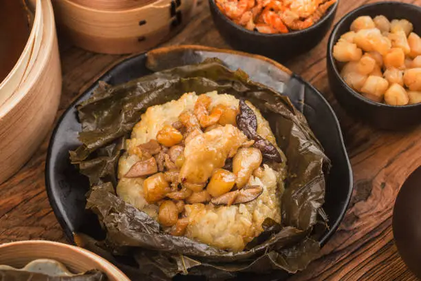 Steamed chicken with lotus leaf sticky rice