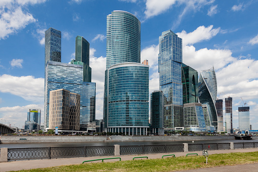 View from the embankment of the Moscow River against the blue sky in white clouds