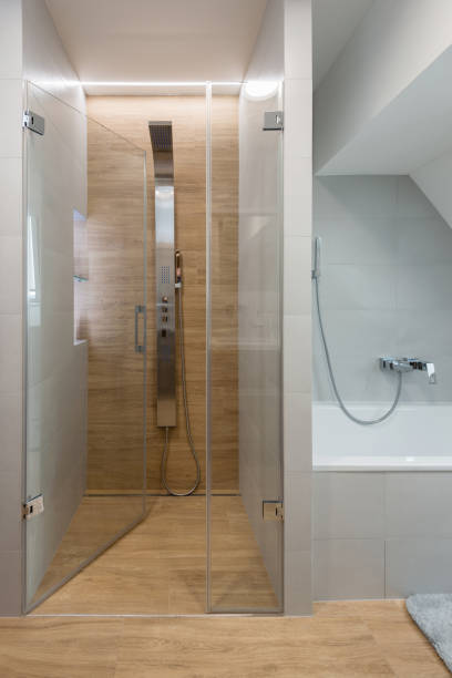 istock Shower and bath tub in bathroom 1304392383