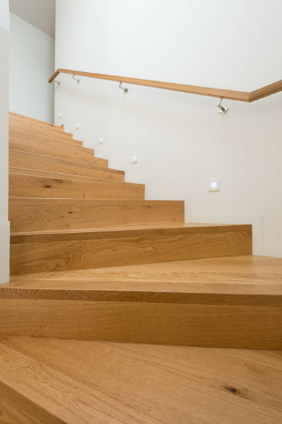 istock wooden stairway in house 1304392519