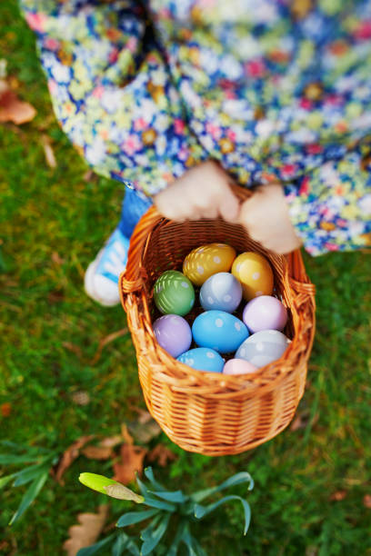 istock Little girl playing egg hunt on Easter 1304392889