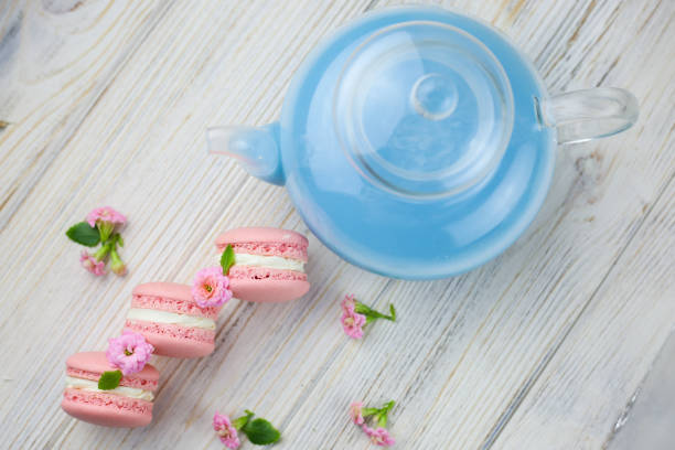 istock Pink macaroons with the pink flowers 1304392946