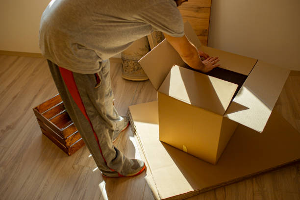 istock Young man packing up for moving home 1304393749