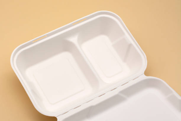 istock White plastic box for food, this can be used with a microwave oven on a beige background 1304395429