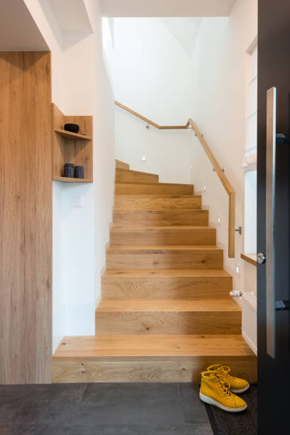 istock Wooden stairway in house 1304395717