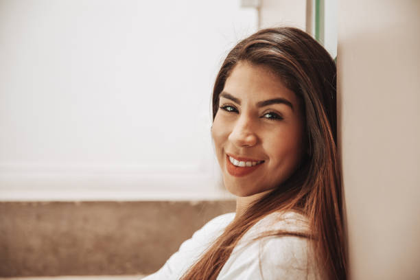 istock Smiling hispanic woman portrait 1304397385