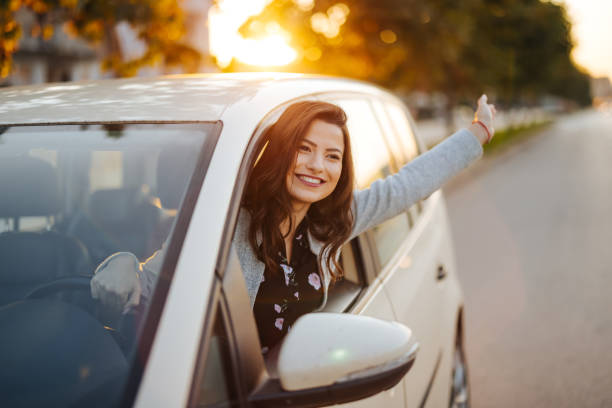 istock Happy woman on a road trip 1304402573