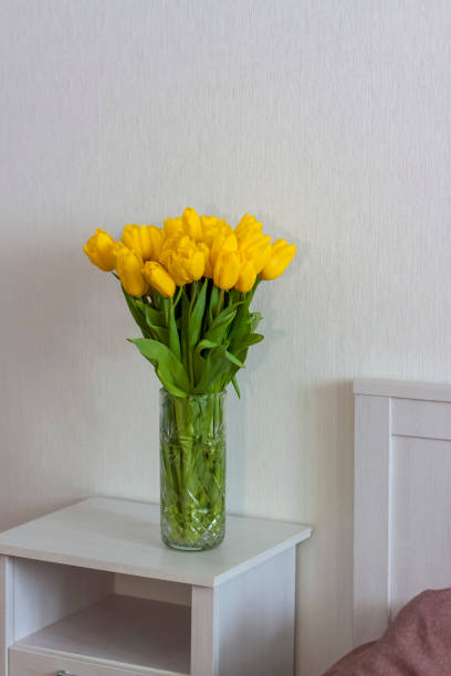 istock A bouquet of fresh yellow tulips. 1304403762