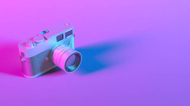 istock camera in purple neon lighting close up 1304406218