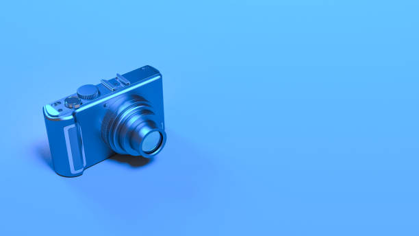 istock photo camera in blue neon lighting close up 1304406229