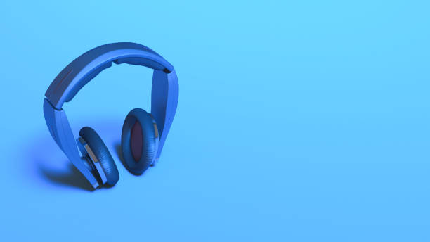 istock headphones in blue neon lighting close up 1304406297