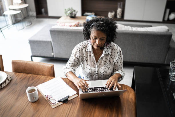 istock Senior woman working as customer service representative at home 1304406417