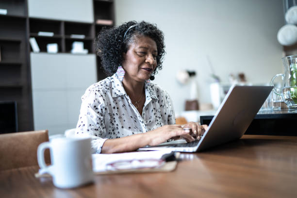 istock Senior woman working as customer service representative at home 1304406419