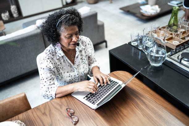 istock Senior woman working as customer service representative at home 1304406422