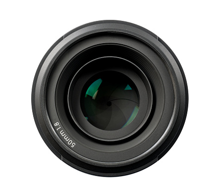 Top view of a 50mm professional optical lens for modern DSLR cameras isolated on a white background. High resolution image. PNG file with transparent background.