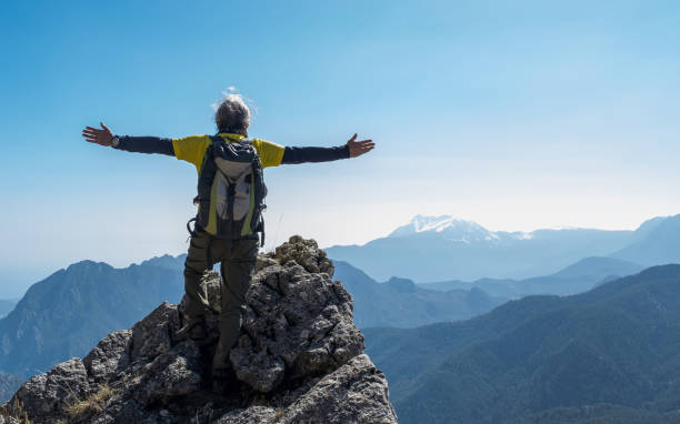 istock Backpacking man watching the view in nature 1304410645