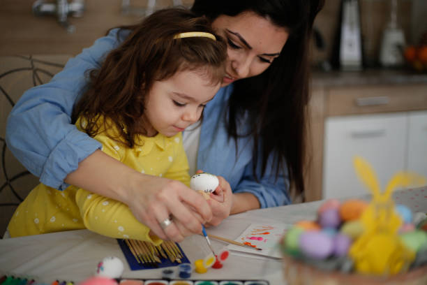 istock Creative Family Easter Egg Coloring Day stock photo 1304411667
