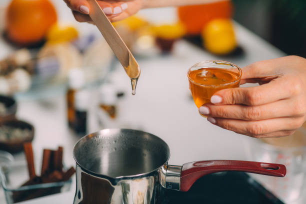istock Woman Making Homemade Soap with Honey 1304413687