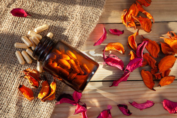 istock Natural herbs in tablets - flower therapy, or essence therapy. CONCEPT. 1304414909